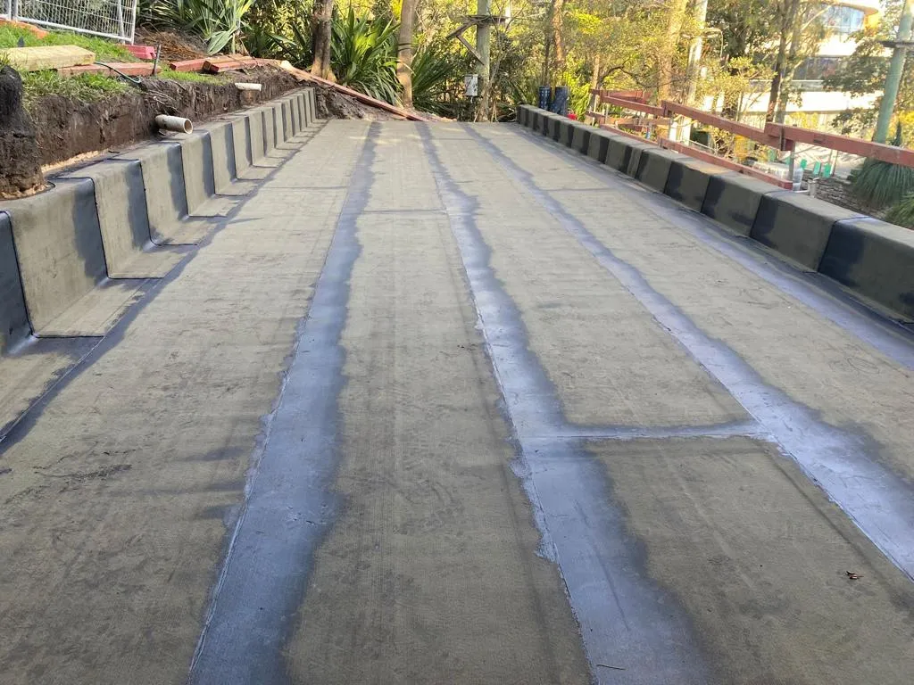 Concrete road with retaining walls.
