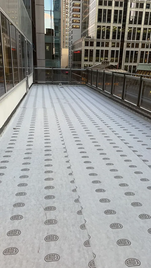 Outdoor balcony flooring in high-rise building.